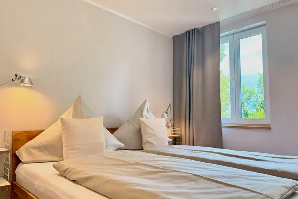 Ferienanlage Villa Hoyerberg Ferienwohnung Villa Hoyerberg Allgäu Lindau und Umgebung - Schlafzimmer - Doppelbett