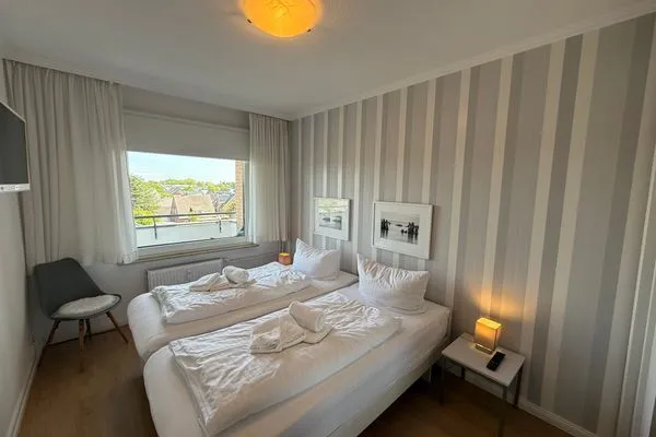 Schlafzimmer Ferienwohnung im Haus Nordland App 83