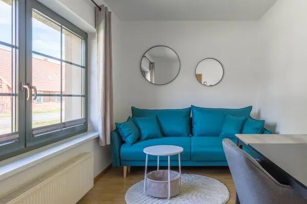 Ferienhaus Wiesenquartier Penkow Wohnbereich mit Schreibtisch  WiesenQuartier