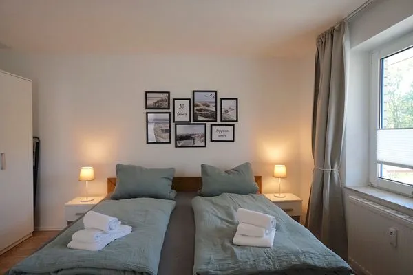 Schlafzimmer  Moderne Ferienwohnung N°9 Stexwig mit Panorama Schleiblick