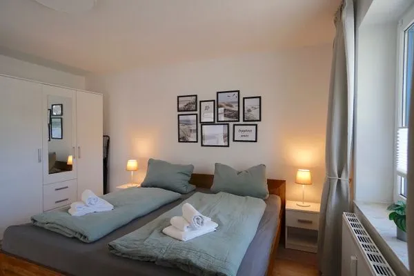 Schlafzimmer  Moderne Ferienwohnung N°9 Stexwig mit Panorama Schleiblick