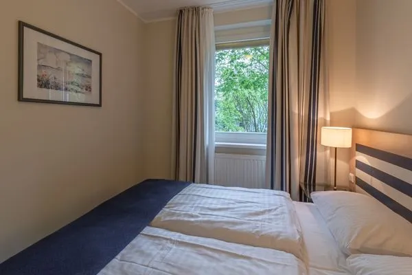 Ferienwohnung Grasnelke in Zingst gemütliches Doppelbett  Grasnelke