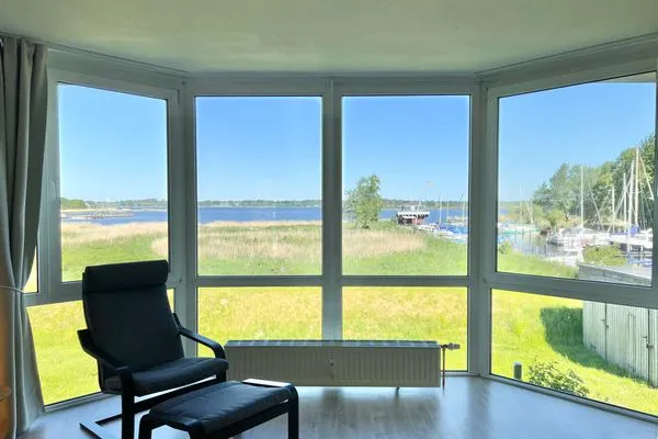 Wohnzimmer  Moderne Ferienwohnung N°9 Stexwig mit Panorama Schleiblick