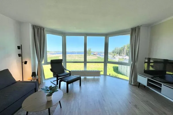 Wohnzimmer  Moderne Ferienwohnung N°9 Stexwig mit Panorama Schleiblick