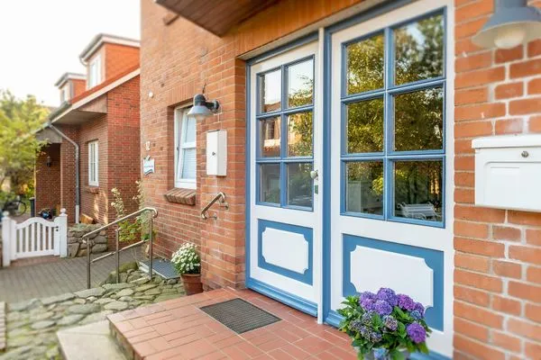 Haus mit der Ferienwohnung Strandlöper in Wittdün auf Amrum Huus Heverknob Ferienwohnung *Strandlöper*