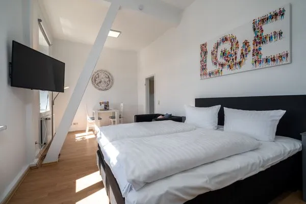 Ferienwohnung SeaLove in Malchow - Bett im offenen Schlafbereich  SeaLove