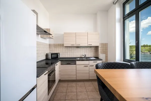 Ferienwohnung BlueSea Malchow - Küche mit Blick auf die Müritz  BlueSea