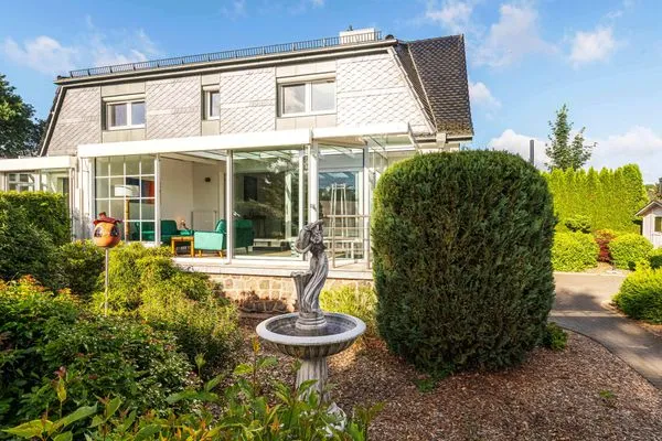 Ferienwohnung Lakeside House Waren (Müritz) - Blick vom Garten in den Wintergarten  Lakeside House