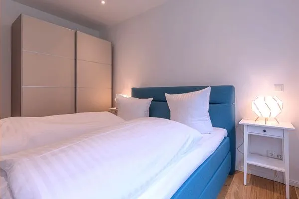 Ferienwohnung Inselpirat Malchow - Schlafzimmer mit Doppelbett  Inselpirat