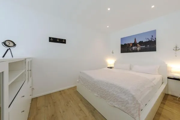 Ferienwohnung Nordlicht in Malchow Blick auf das Doppelbett  Nordlicht