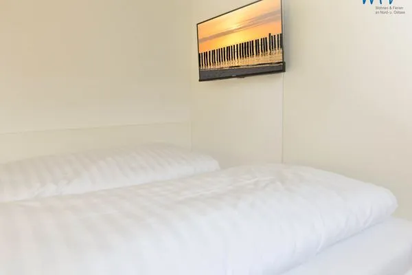 Schlafzimmer Haus am Dorfbrunnen Ferienwohnung Strandfloh