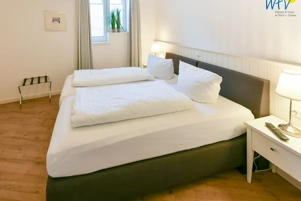 Schlafzimmer Ferienhaus "Meine Insel Juist" Ferienwohnung Düne