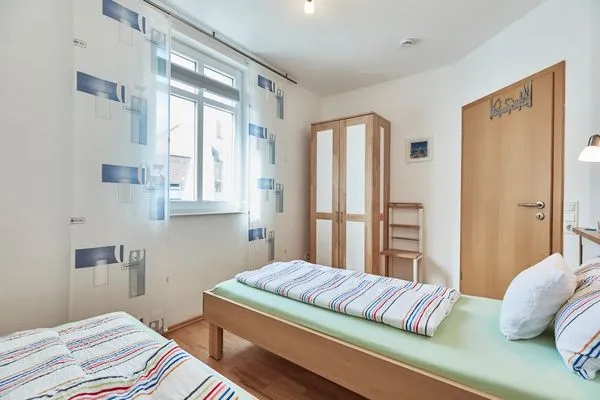 Schlafzimmer  Haus Stella Maris - Ferienwohnung Lichtblick