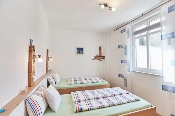 Schlafzimmer  Haus Stella Maris - Ferienwohnung Lichtblick