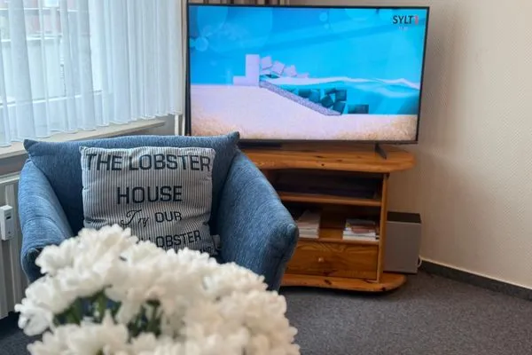 Neues TV- Gerät Ferienwohnung im Haus Nordland App 48,(Hund)