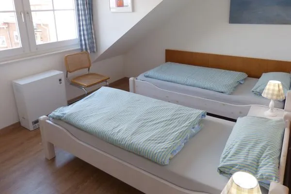 Schlafzimmer in der Ferienwohnung Alpenstrandläufer in Wittdün auf Amrum Haus *Südspitze 17* Ferienwohnung *Alpenstrandläufer*