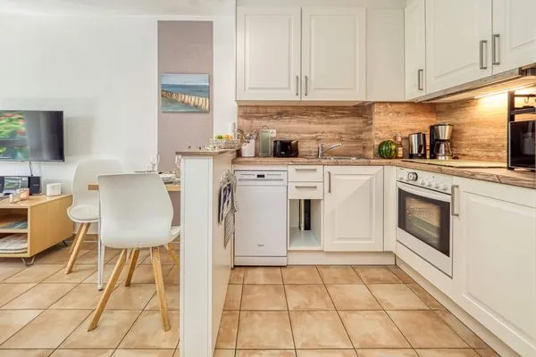 Essbereich mit Küchenzeile Residenz am Strand Backfisch - Wohnung 5-66