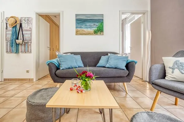 Wohnbereich mit Sofa Residenz am Strand Backfisch - Wohnung 5-66