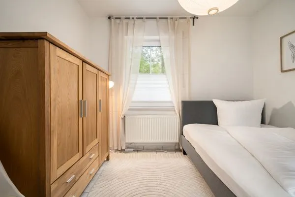 Ferienhaus Zander Fuenfseen Schlafzimmer im Erdgeschoss  Zander