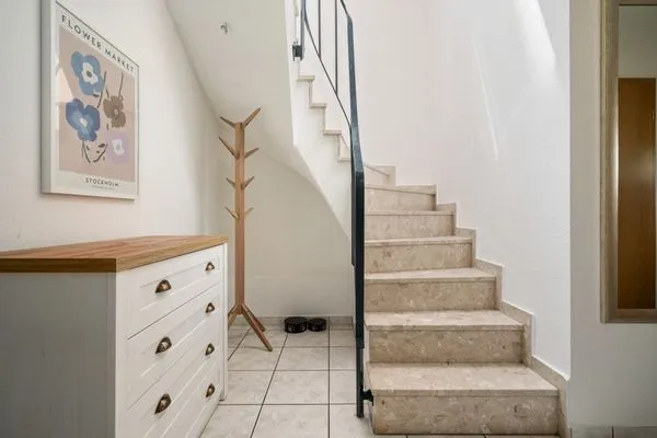 Ferienhaus Zander Fuenfseen Flur im Erdgeschoss mit Wendeltreppe  Zander