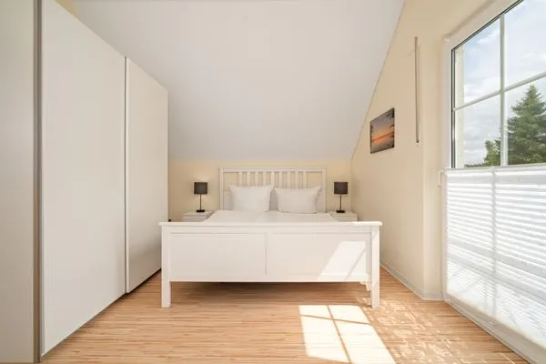 Ferienhaus Schwanensee Ferienpark Lenzer Höh Schlafzimmer Obergeschoss mit Blick ins Grüne  Schwanensee