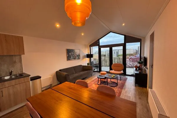 Living room Enkhuizer Strand Chalet Meereszauber mit Zaun Nr. 304