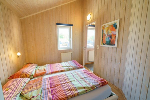  Ferienhaus Kum Weer Otterndorf - Schlafzimmer mit Doppelbett
