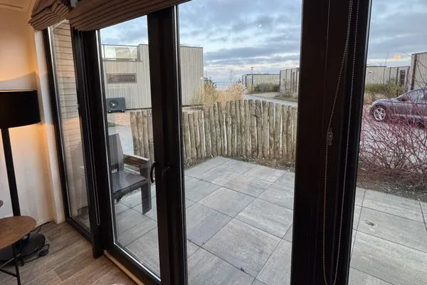 Living room Enkhuizer Strand Chalet Meereszauber mit Zaun Nr. 304