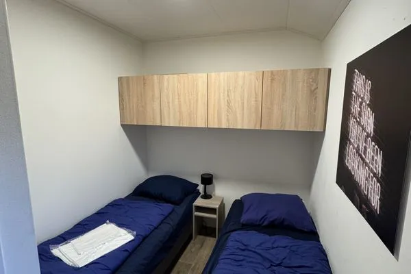 Bedroom Enkhuizer Strand Chalet Meereszauber mit Zaun Nr. 304