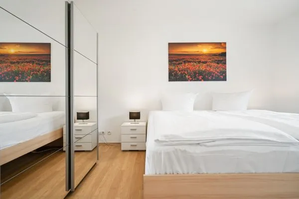 Ferienhaus Landhus Alt Schwerin Schlafzimmer mit Boxspringbett  Landhus