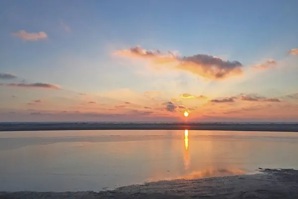 Sonnenuntergang auf der Insel Amrum Friesenhaus Amrum Ferienhaushälfte „Klönschnack"