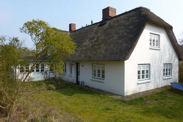 Friesenhaus Amrum mit der Friesenhaushälfte "Klönschnack"in Süddorf auf Amrum Friesenhaus Amrum Ferienhaushälfte „Klönschnack"
