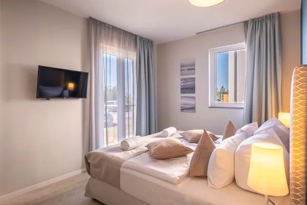 Ferienwohnung Seestern Wustrow Schlafzimmer mit TV  Seestern