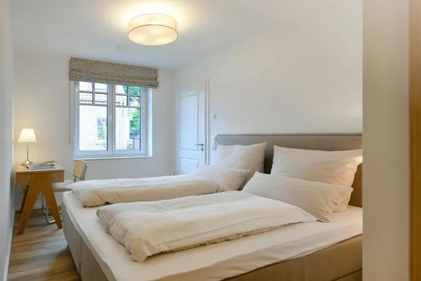 Schlafzimmer Haus Casper Ferienwohnung Watt'n Platz