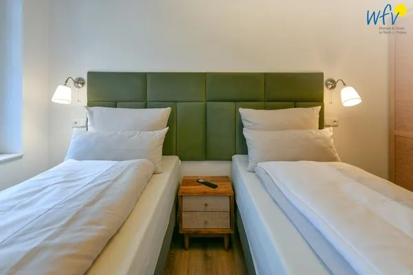 Schlafzimmer Haus Casper Ferienwohnung Strandstuuv