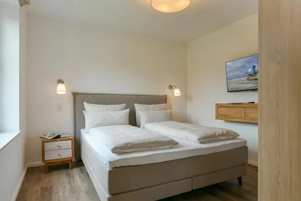 Schlafzimmer Haus Christine Ferienwohnung Düünstuuv