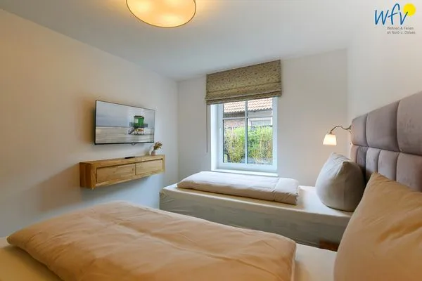 Schlafzimmer Haus Christine Ferienwohnung Düünstuuv