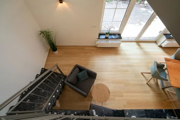 Ferienhaus Landhus Alt Schwerin Wohnzimmer Wendeltreppe  Landhus