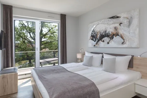 Ferienwohnung Anastasia Waren Schlafzimmer 1 mit Balkon  Anastasia