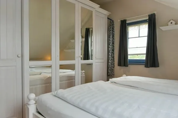 Schlafzimmer Villa Sommerwind Ferienwohnung 6