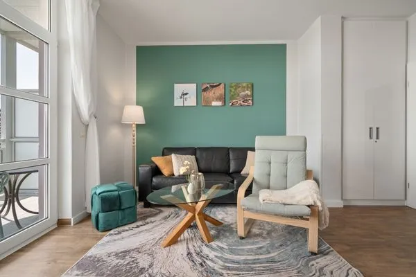 Ferienwohnung Müritzloge Waren (Müritz) - mit stilvoll eingerichteten Wohnzimmer  Müritzloge