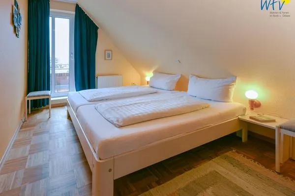 Schlafzimmer Haus Dünenblick Ferienwohnung 20