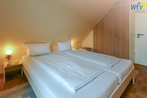 Schlafzimmer Haus Dünenblick Ferienwohnung 20