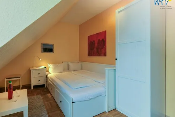 Schlafzimmer Haus Dünenblick Ferienwohnung 20