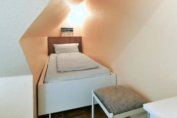 Schlafzimmer Haus Dünenblick Ferienwohnung 20