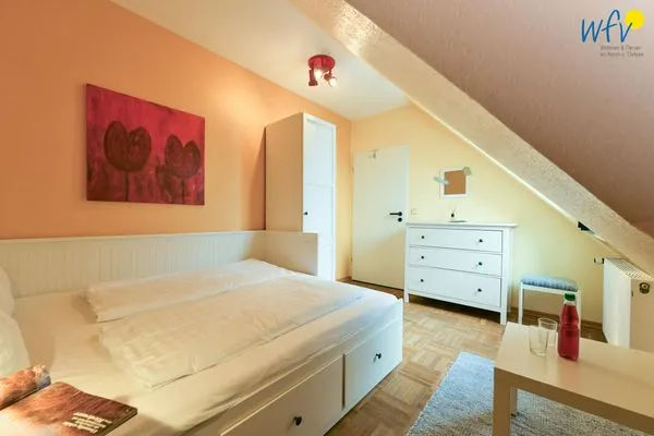 Schlafzimmer Haus Dünenblick Ferienwohnung 20