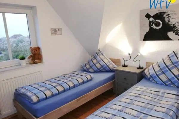 Schlafzimmer Haus Riffstraße 2c Ferienwohnung Urlaubsoase