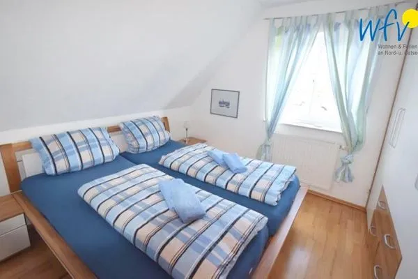 Schlafzimmer Haus Riffstraße 2c Ferienwohnung Urlaubsoase