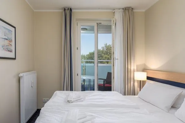 Ferienwohnung Seestern Zingst Schlafzimmer mit Balkon  Seestern