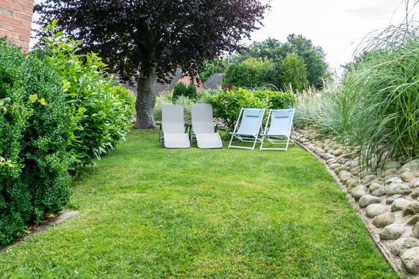  Ferienwohnung Wattlöwe Tönning - Rasenfläche